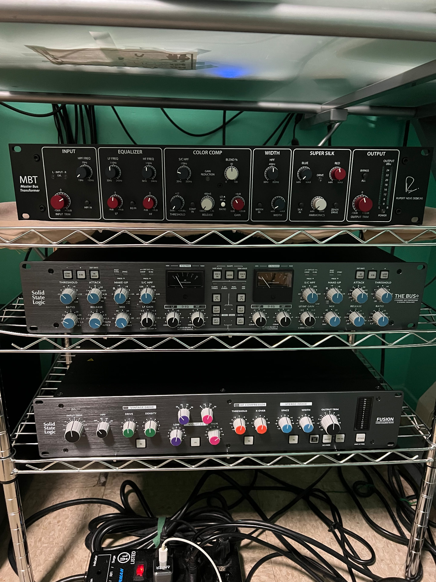 Rupert Neve Master Bus Transformer and Solid State Logic bus compressors racked in the studio
